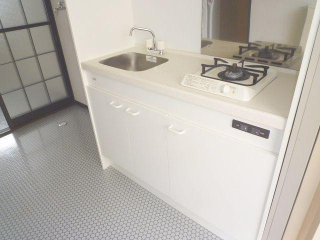 Kitchen. It is a beautiful gas stove. 