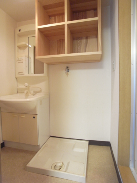 Washroom. There is also a convenient shelf to Laundry Area