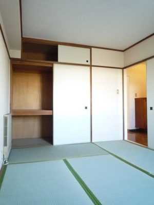 Living and room. Storage rich Japanese-style room with a closet with upper closet.