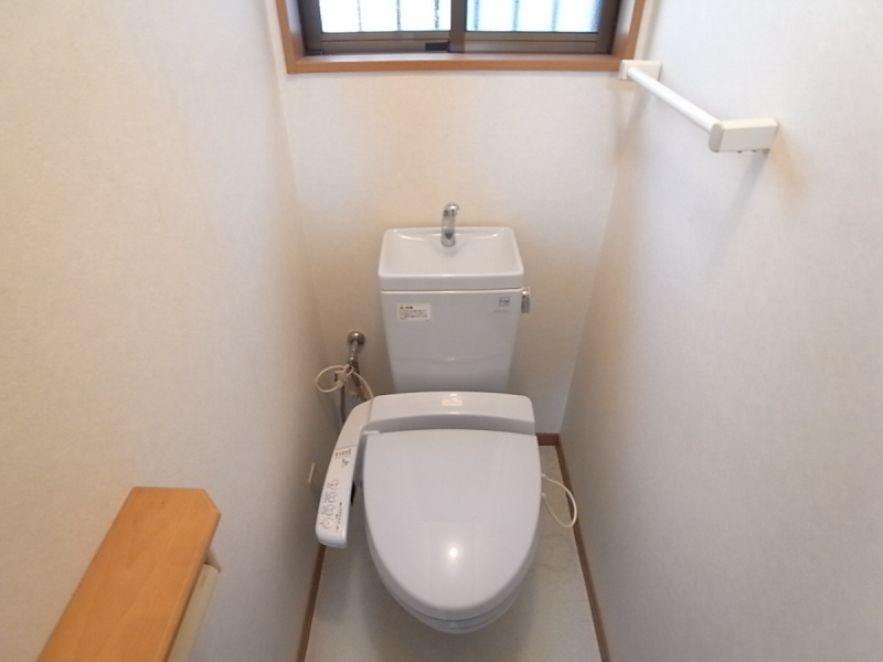 Toilet. Washlet is with