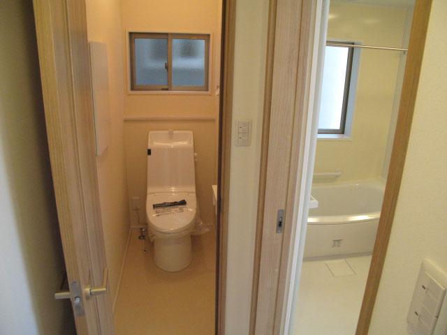 Toilet. Concentrated around water. Toilet and a wash room.