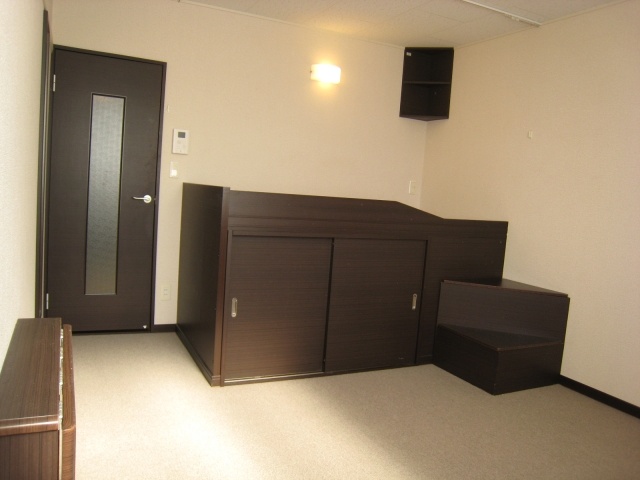 Living and room. Under the bed space is large storage space. You can use it comfortably chair
