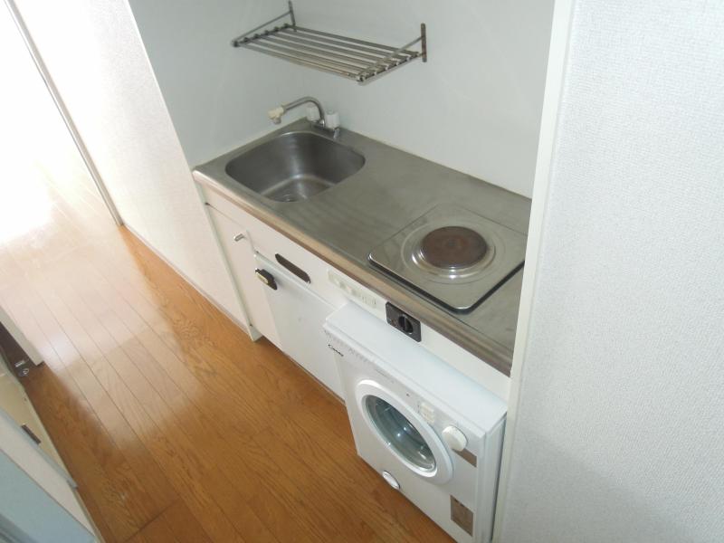 Kitchen. Also it comes with a washing machine