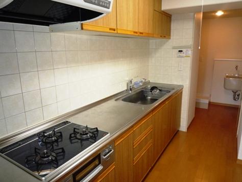 Kitchen. Wide kitchen work space has been enhanced