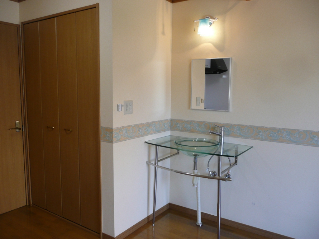 Washroom. Washbasin of stylish glass