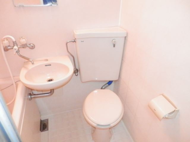 Toilet. There is also a wash basin