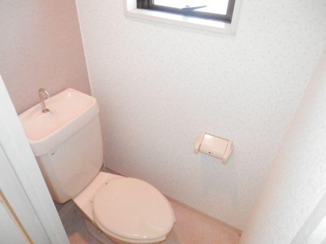 Toilet. There are ventilation window