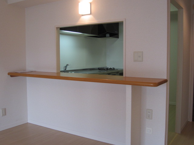 Living and room. Convenient counter kitchen