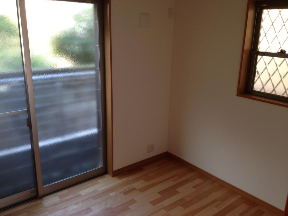 Non-living room. Comfortable could live likely with plenty of storage space