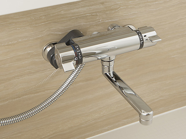 Bathing-wash room.  [Mixing faucet with thermostat] In mixing faucet with a temperature adjustment, It can be adjusted to a temperature of preference.