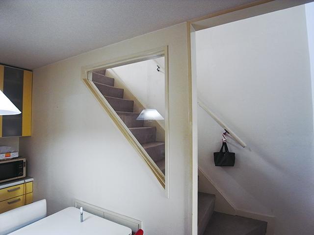 Living. To capture the light from the stairs