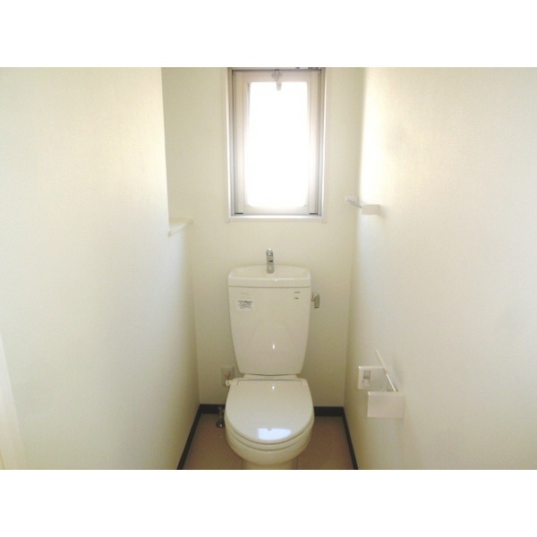 Toilet. It is with a window