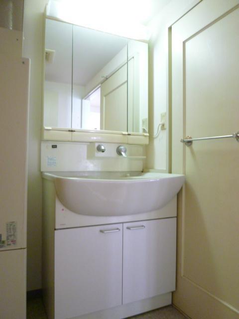 Wash basin, toilet. Vanity of the shower with the water washing, It can be stored up to the back of the mirror.