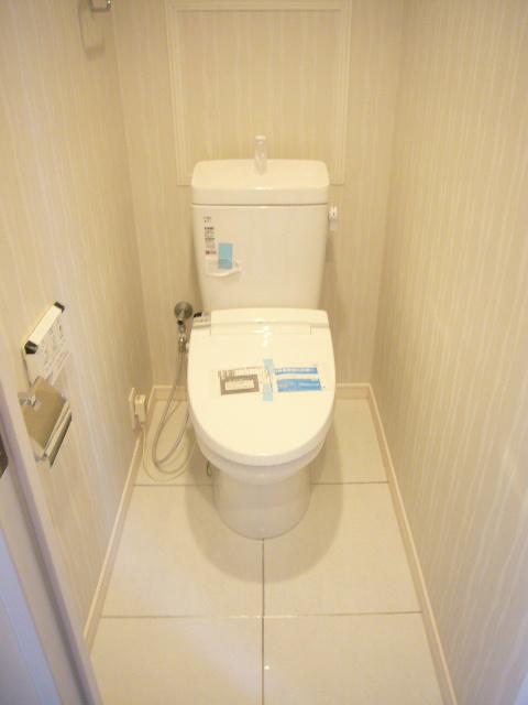 Toilet. Toilet warm water cleaning toilet seat is standard equipment.