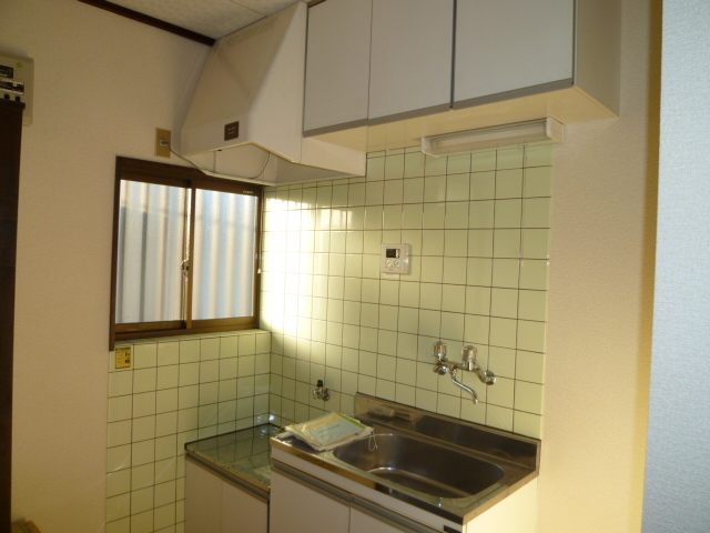 Kitchen. There is a small window