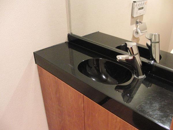 Toilet. The toilet, There is artificial marble made of hand-washing bowl.