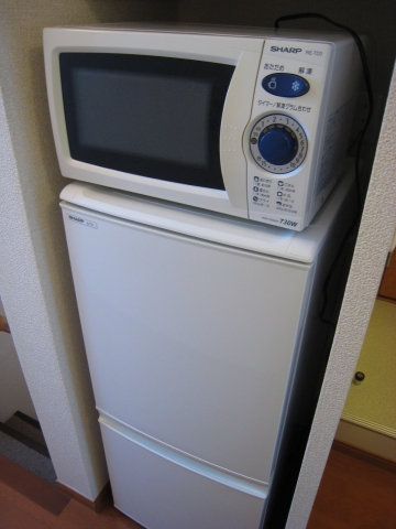 Other Equipment. Refrigerator & attaches microwave
