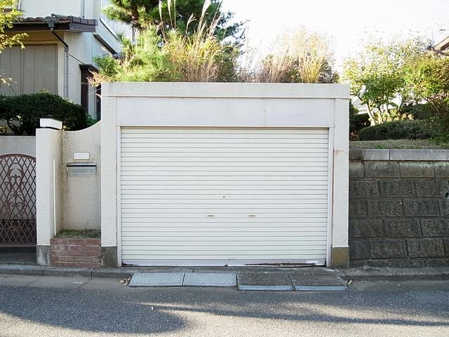 Parking lot. Garage with shutter