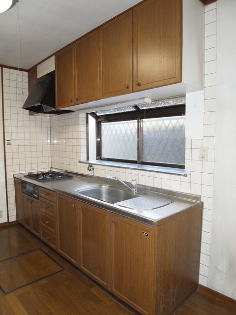 Kitchen. Back door ・ Ventilation good kitchen space with a window