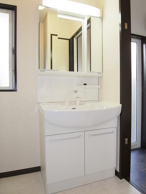 Wash basin, toilet. Vanity replaced.