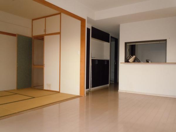 Living. White floor will further brighten the room.