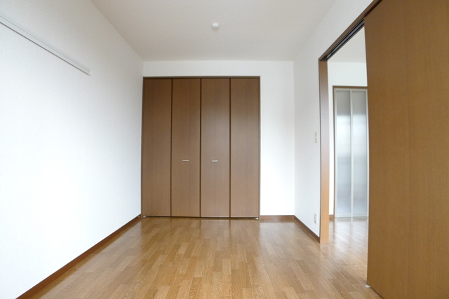 Other room space. The color tone of the flooring had settled