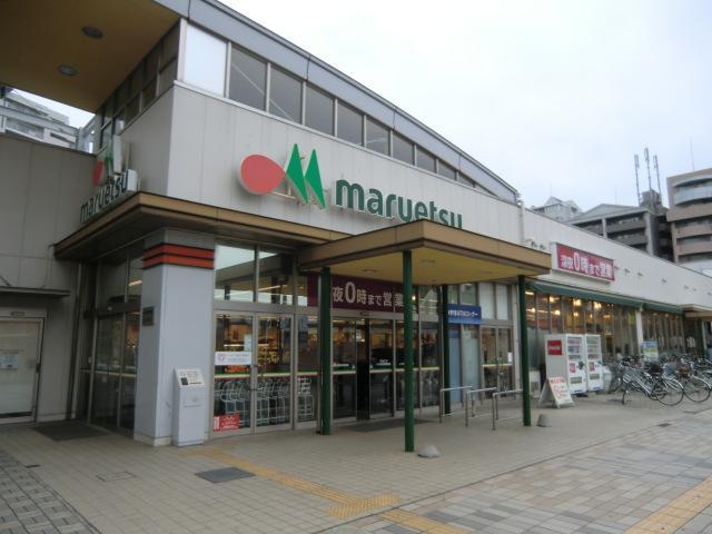 Other. The front of the station there is a supermarket which is open until midnight