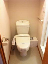 Toilet. Cold winter is also warm with warm water washing toilet seat