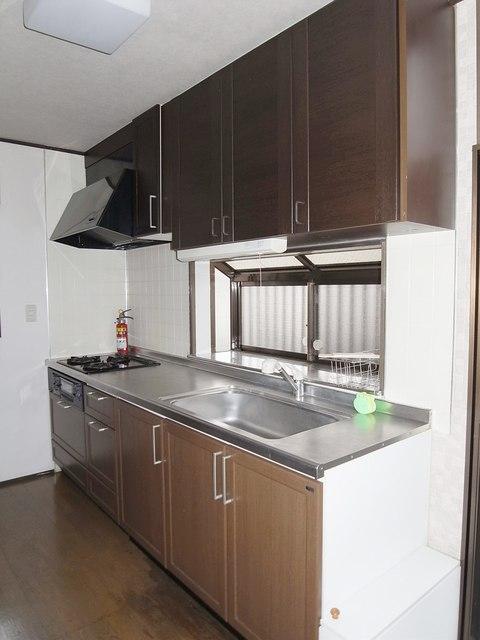 Kitchen. window ・ Kitchen space with a back door