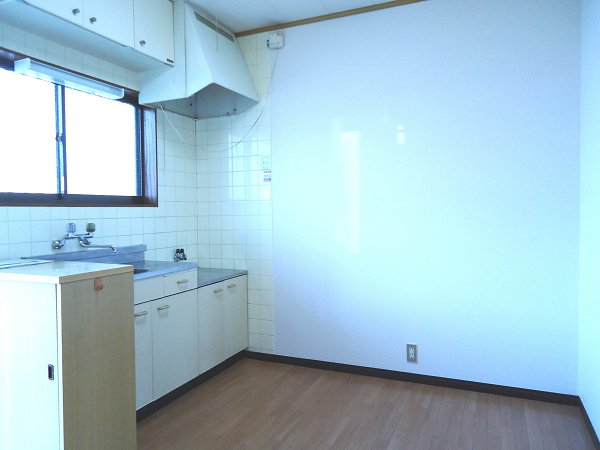 Living and room. You could use spacious also put the refrigerator