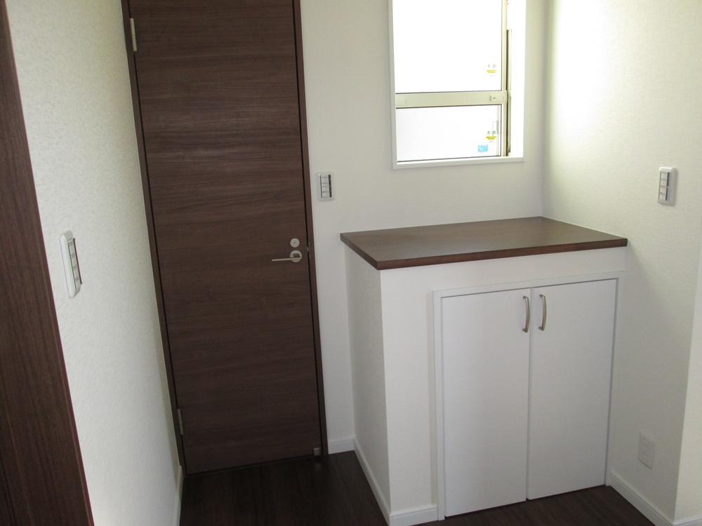 Entrance. It is the entrance hall. There is a shoe closet is on the right side, Storage is abundant.