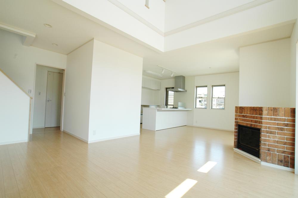 Model house photo. Spacious living