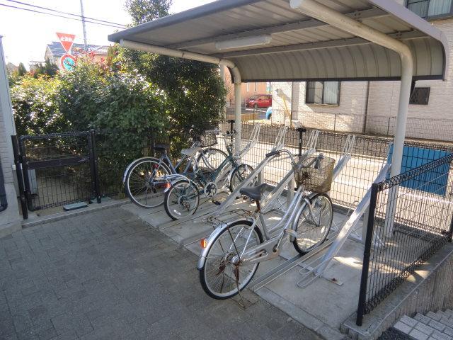 Other. Bicycle parking lot is equipped with roof