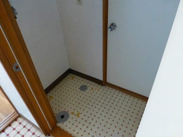 Other room space. Washing machine in the room