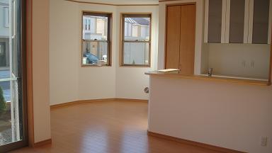 Living. Room: soft curve Earl type design. Face-to-face kitchen will deepen ties of family.