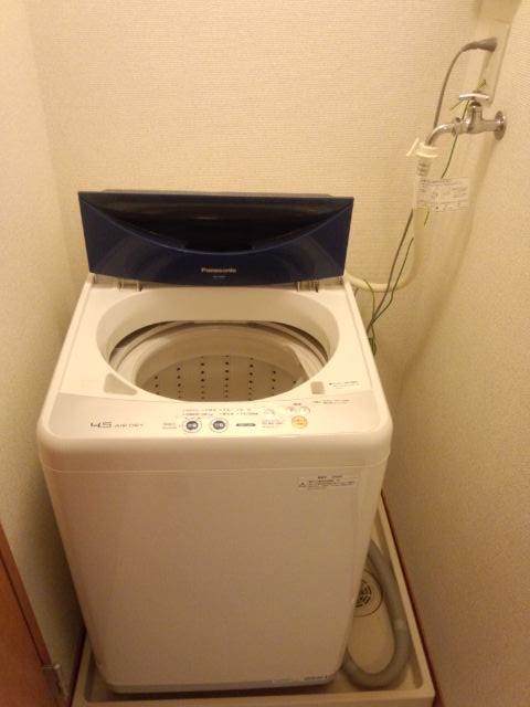 Bath. Washing machine with. It is the room.