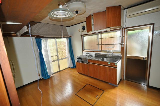 Other. There is a back door next to the kitchen, Convenient.