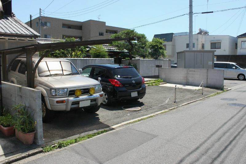 Parking lot. Parking is there is space for 2 cars. 