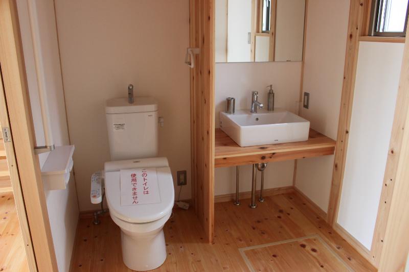 Toilet. toilet, Also I felt the warmth of solid wood washroom.