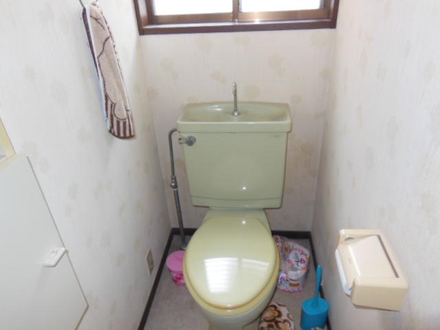 Toilet. Autumn leaves town Detached toilet