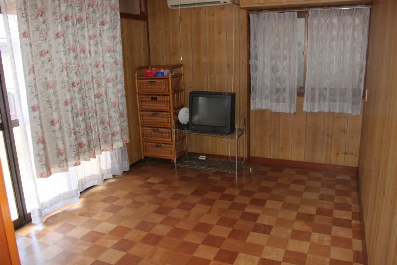 Non-living room. The other second floor room is Interoceanic. You can choose either faction.
