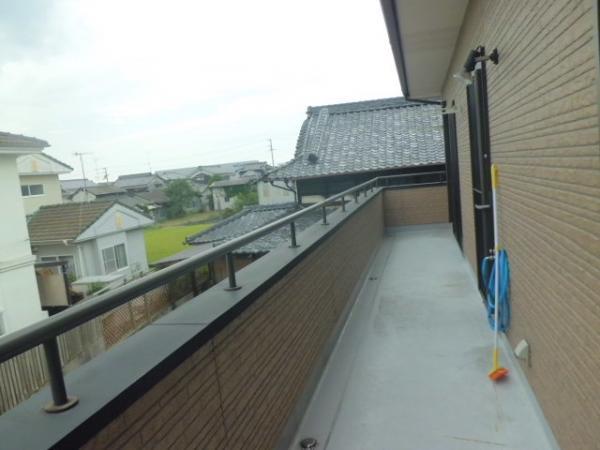 Balcony. South-facing with a wide veranda.