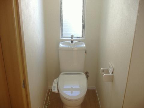 Toilet. Toilet newly established with warm water cleaning toilet seat