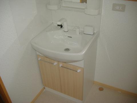 Wash basin, toilet. Washing machine is now put in a room by the basin undressing room expansion