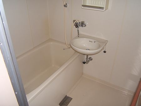 Bath. It is a clean white bath. 
