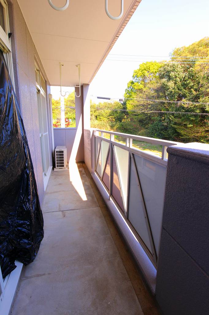 Balcony. It is a photograph of another in Room