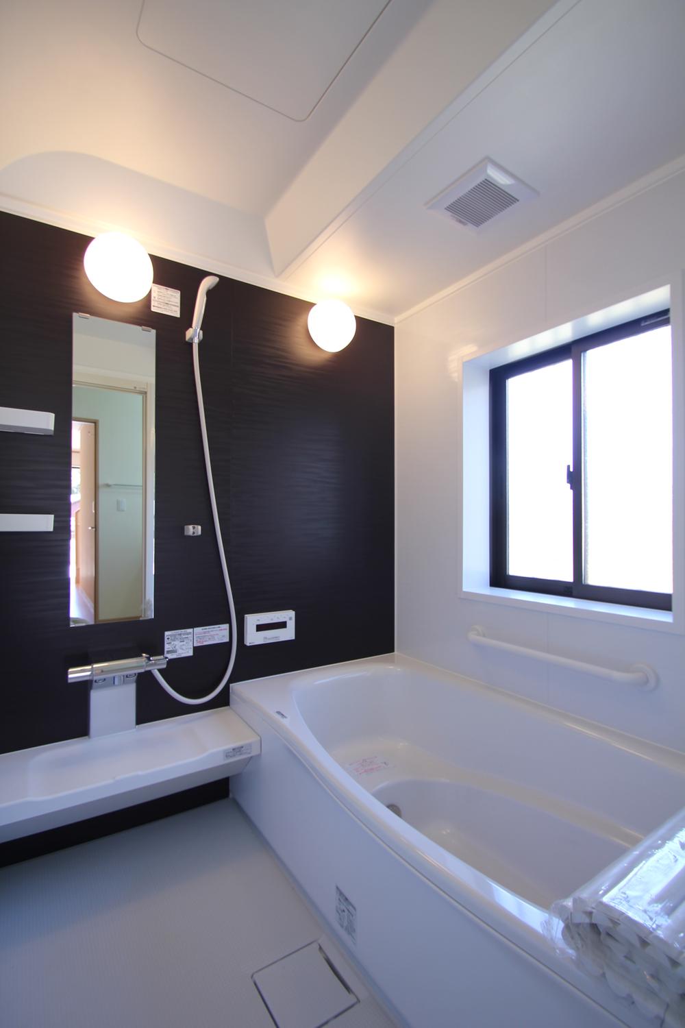 Bathroom. The photograph is the same type