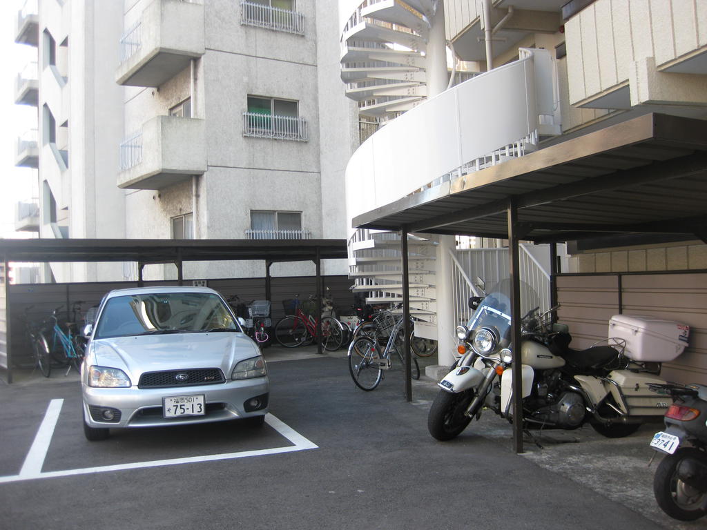 Building appearance. Parking Lot ・ Bicycle-parking space