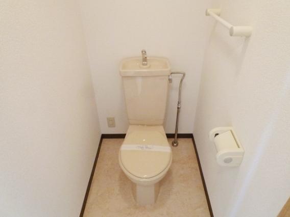 Toilet. Same thing the other room