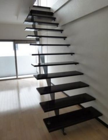 Living and room. Fashionable stairs